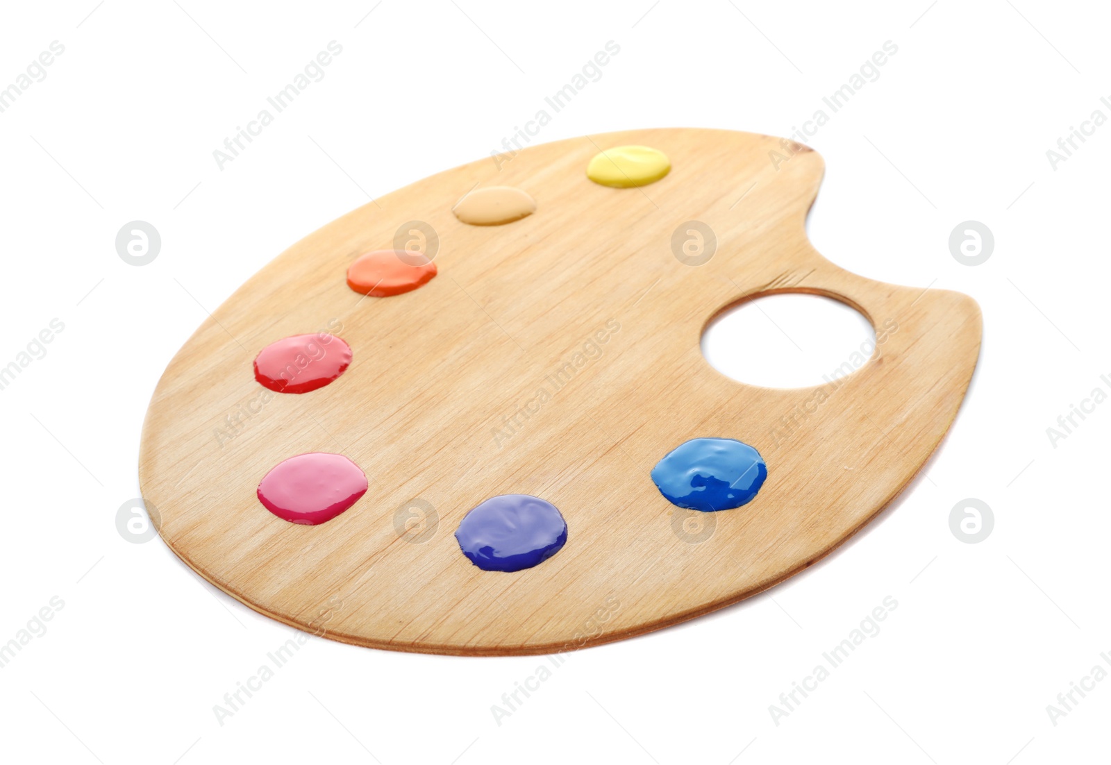 Photo of Palette with paints on white background