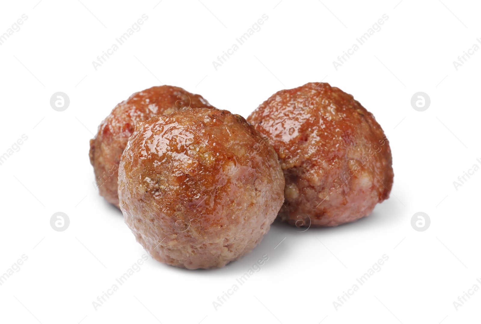 Photo of Three tasty cooked meatballs on white background