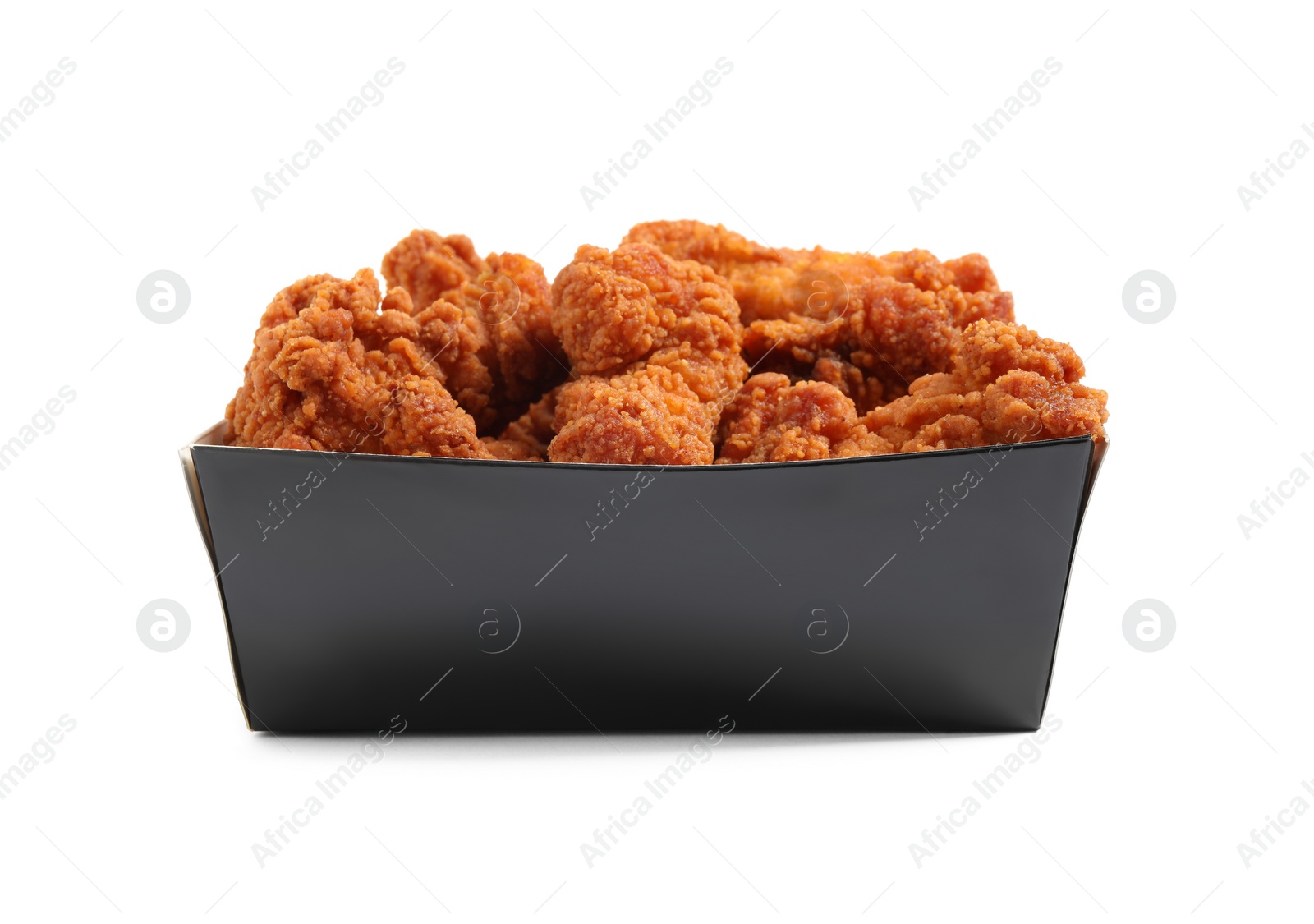 Photo of Tasty deep fried chicken pieces isolated on white