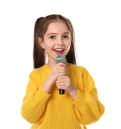 Photo of Little girl singing into microphone on white background