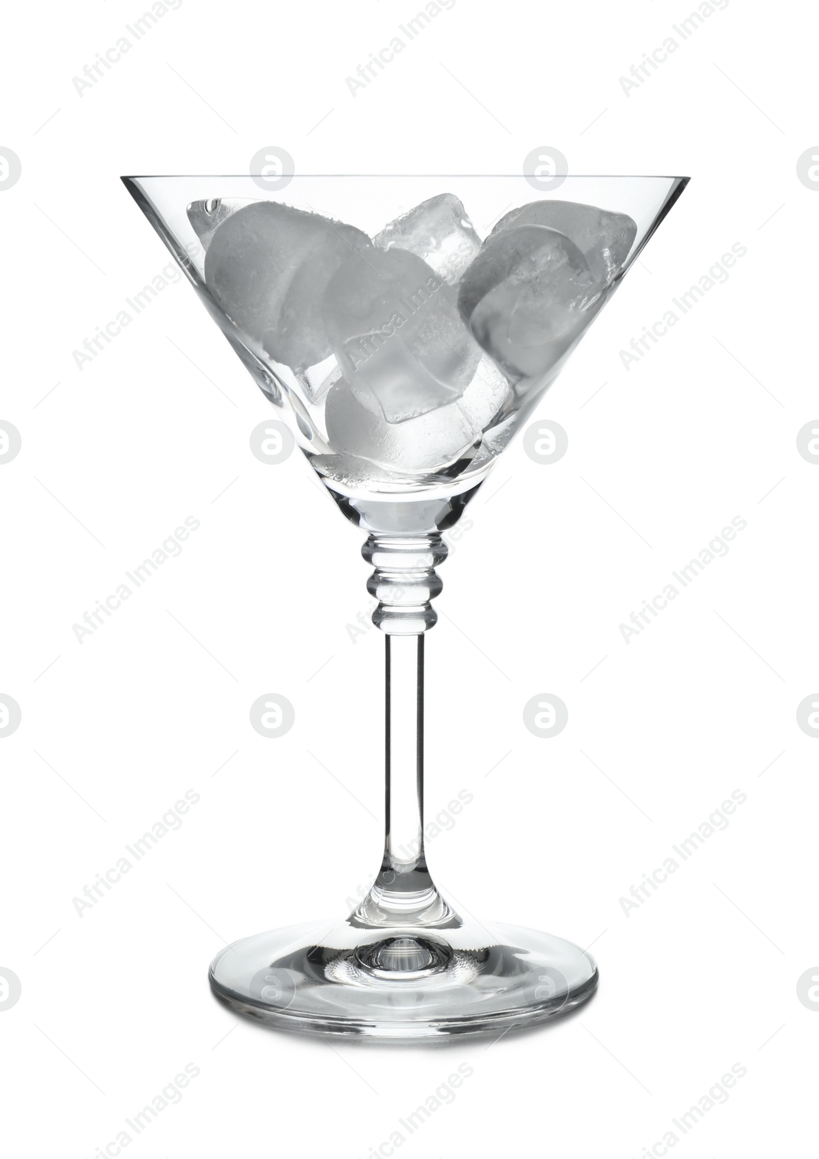 Photo of Martini glass with ice cubes on white background