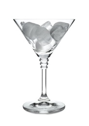 Martini glass with ice cubes on white background