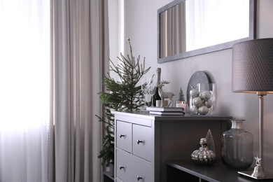 Photo of Beautiful room interior decorated for Christmas with potted fir