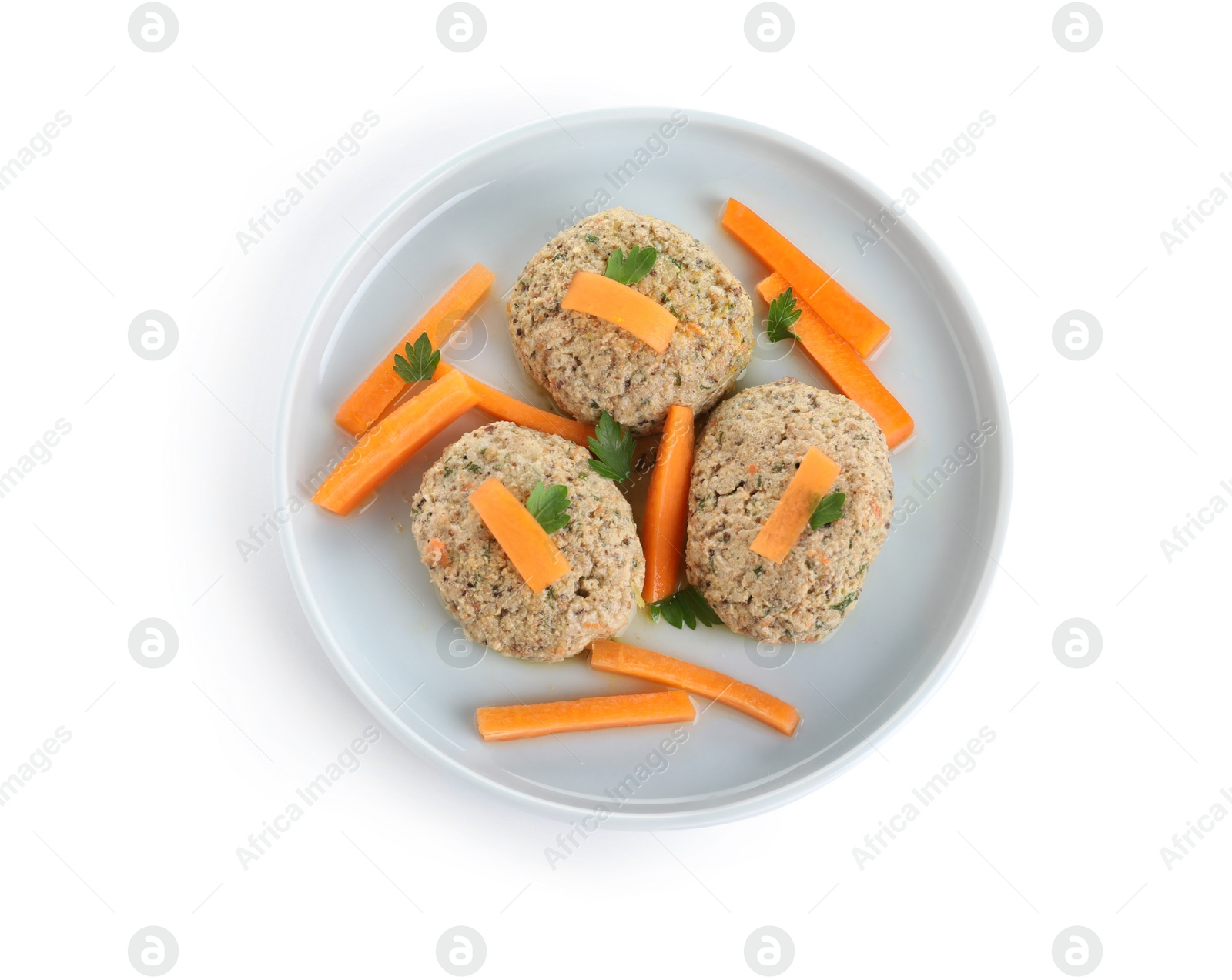 Photo of Plate of traditional Passover (Pesach) gefilte fish on white background, top view