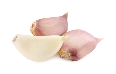 Photo of Cloves of fresh garlic isolated on white