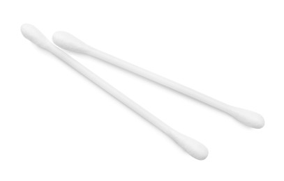 Photo of Plastic cotton buds on white background, top view