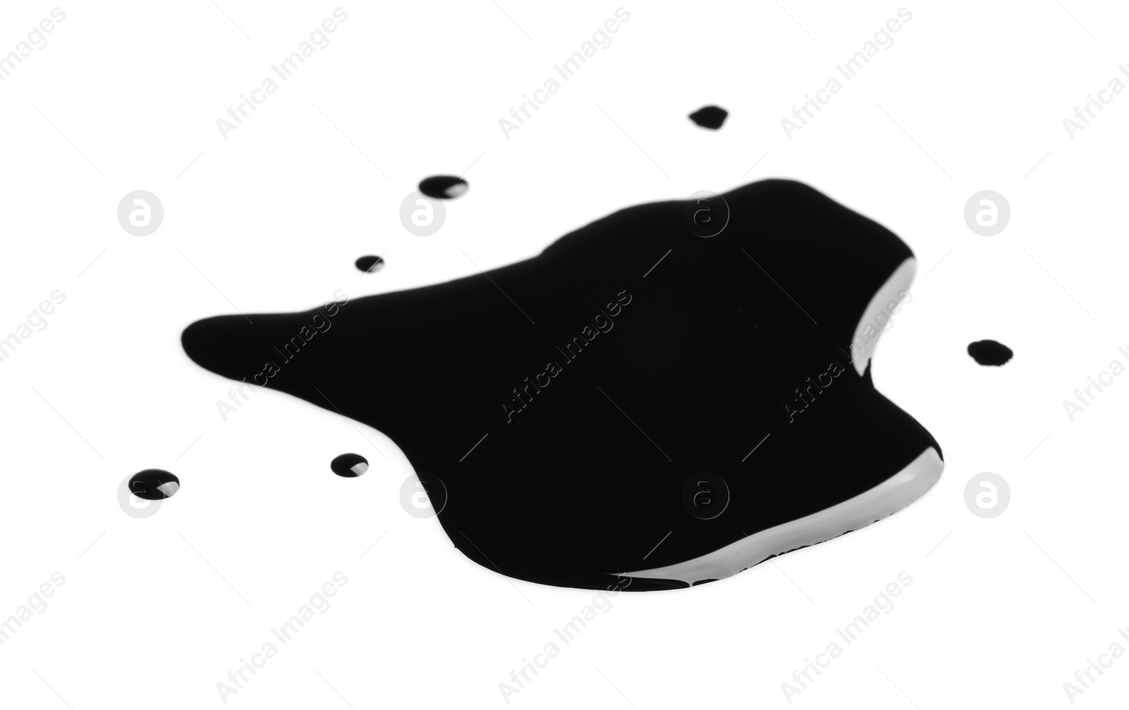 Photo of Blots of black paint on white background