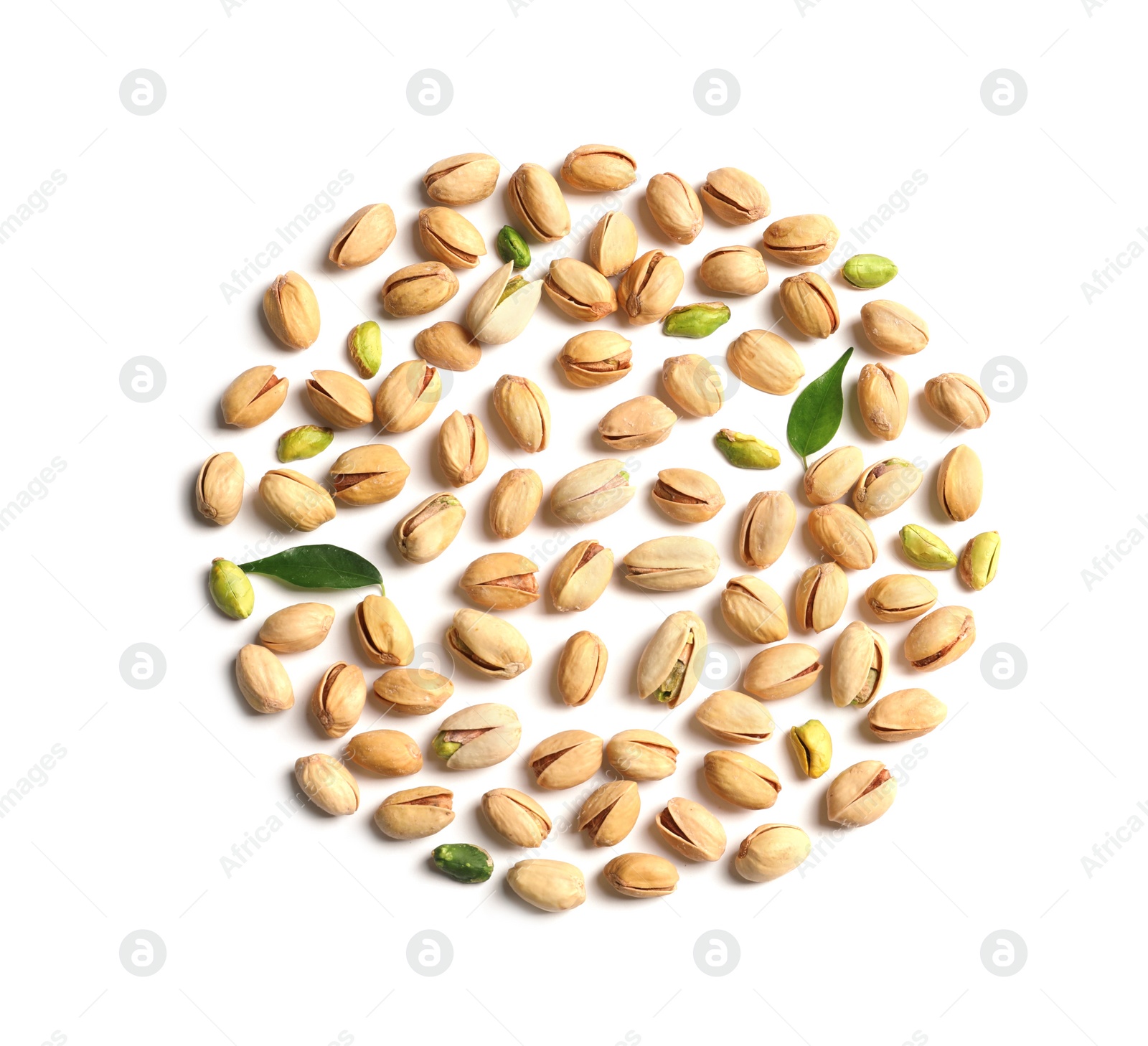 Photo of Organic pistachio nuts on white background, flat lay