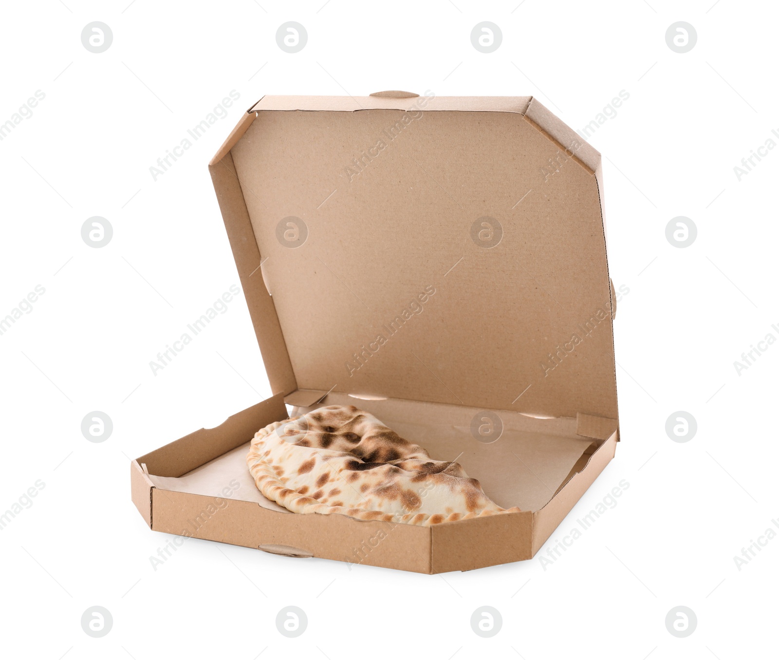 Photo of Cardboard box with delicious calzone on white background