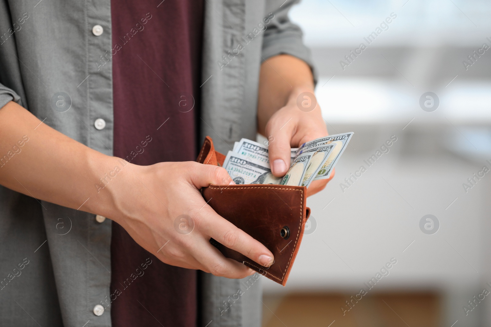 Photo of Man with American money in wallet, closeup