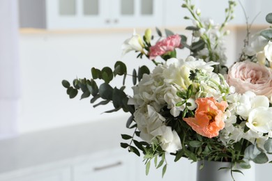 Bouquet of different beautiful flowers indoors, closeup