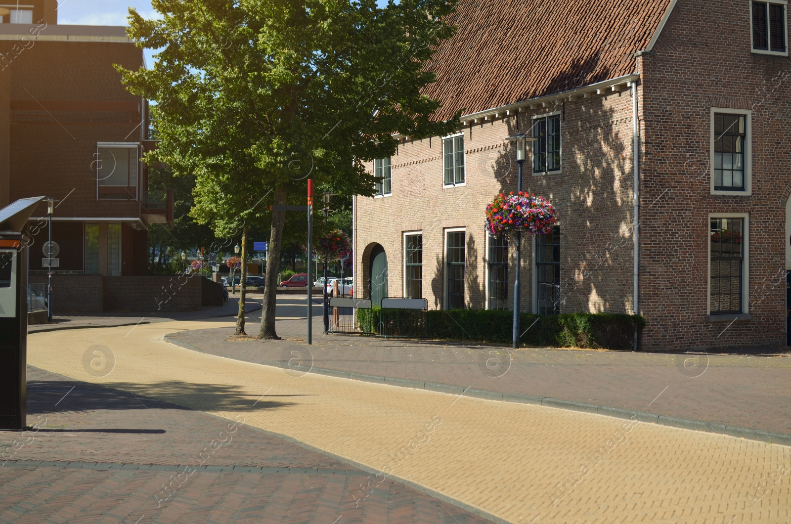 Photo of Beautiful view of city street with buildings and road