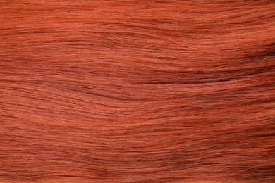 Photo of Texture of red hair as background, closeup