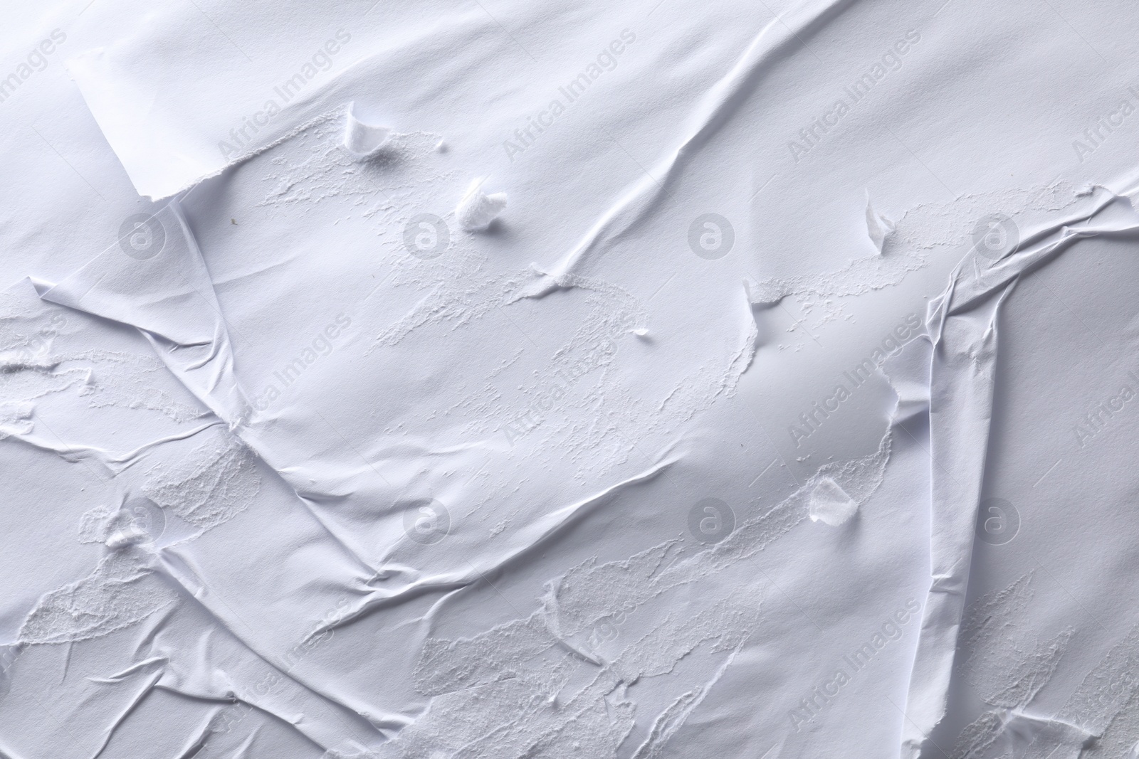 Photo of Texture of white creased paper as background, top view. Wall poster