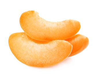 Slices of delicious ripe apricot isolated on white