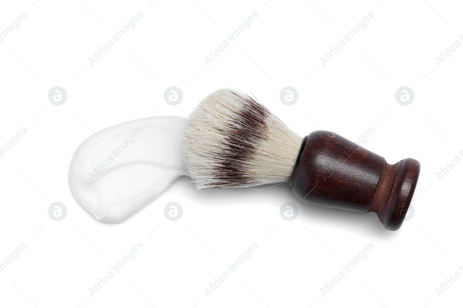 Photo of Shaving brush and foam on white background, top view