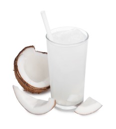 Photo of Glass of coconut water, ice cubes and nut isolated on white