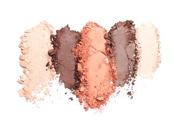 Photo of Crushed eye shadows on white background, top view. Professional makeup product