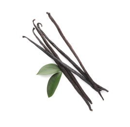 Aromatic vanilla pods and leaves isolated on white, top view