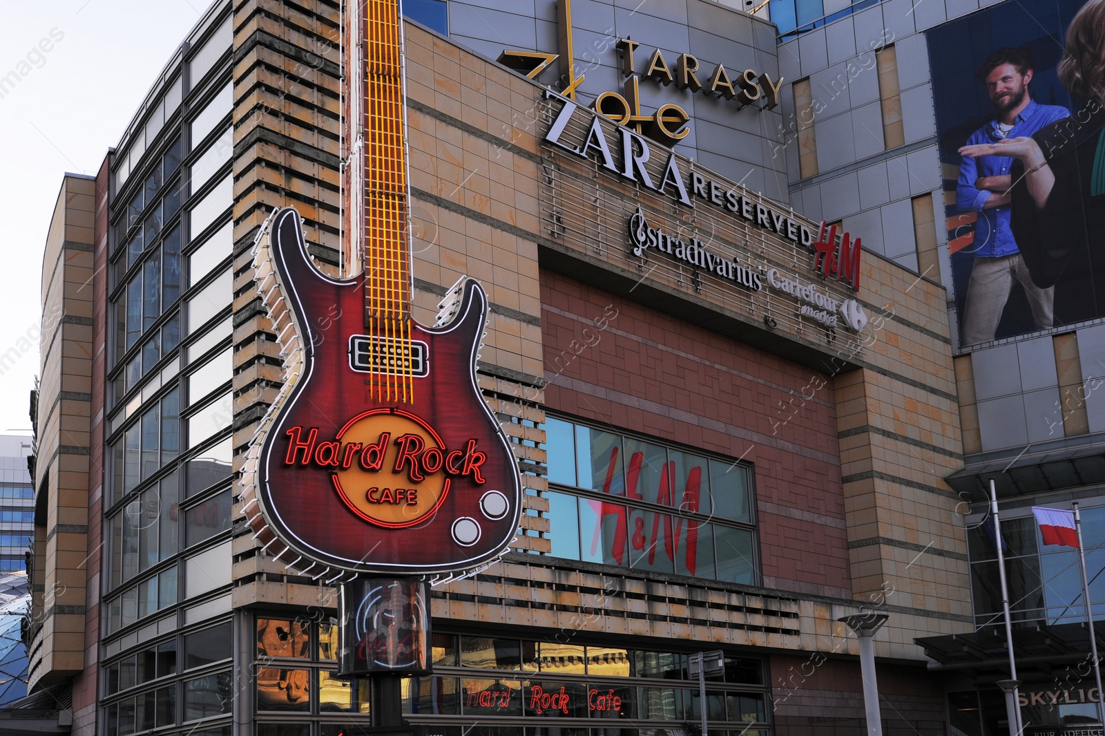 Photo of WARSAW, POLAND - MARCH 22, 2022: Shopping mall Golden Terraces on city street