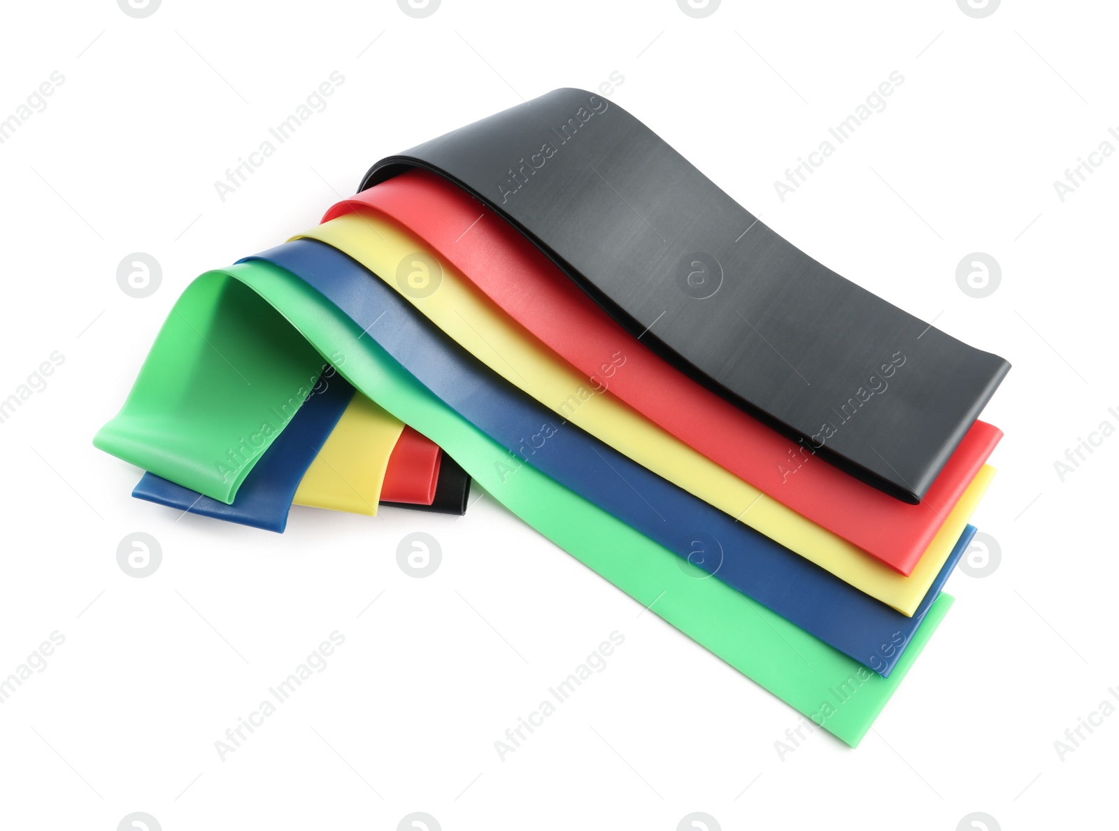 Photo of Set of fitness elastic bands on white background