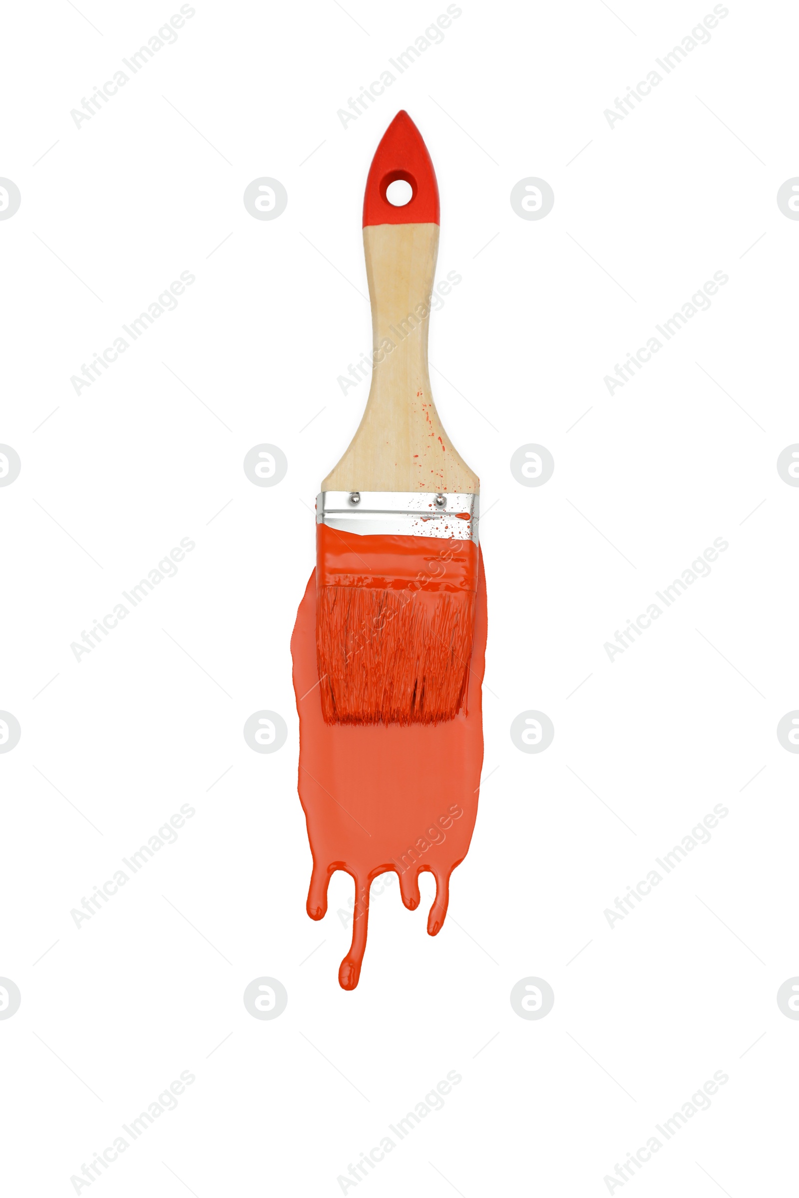 Photo of Stroke of orange paint and brush on white background, top view