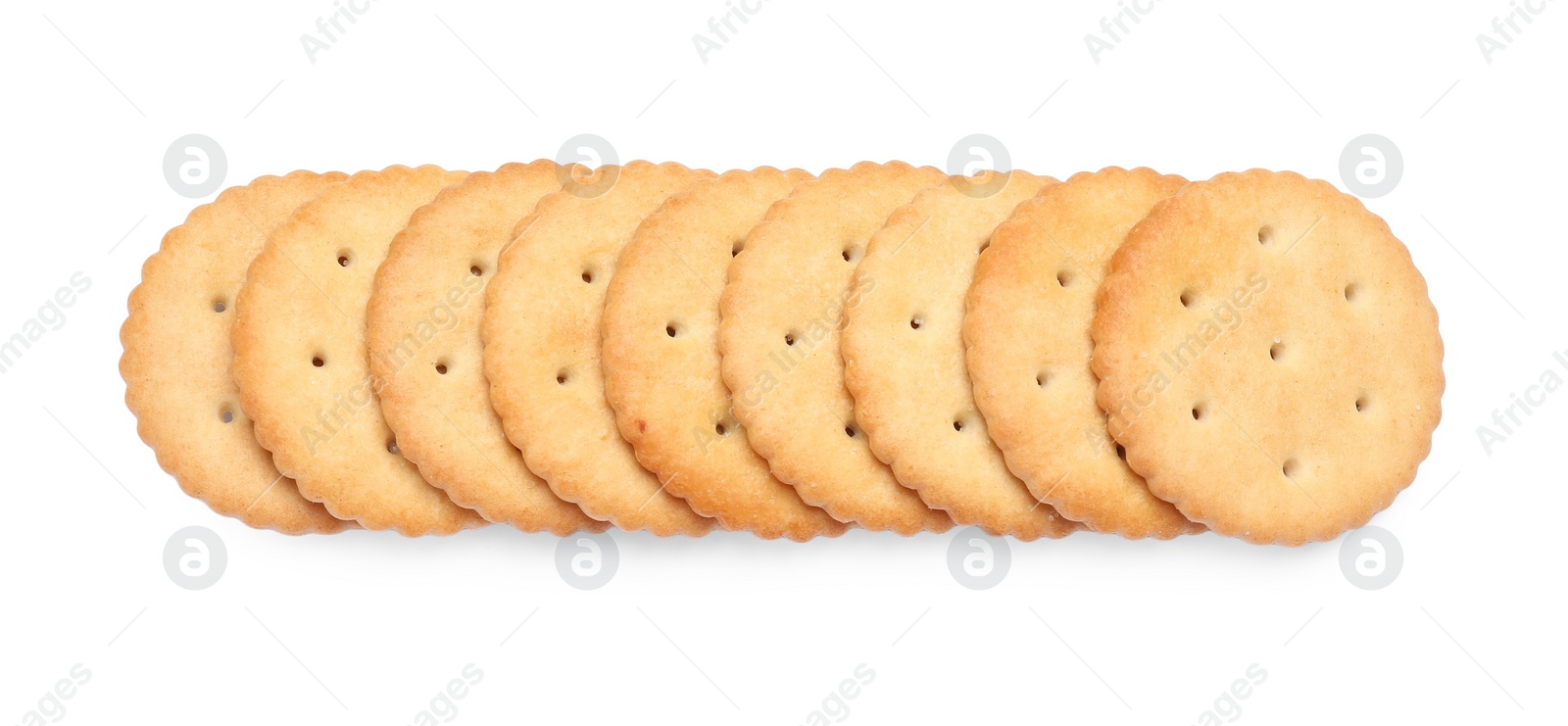 Photo of Many crispy crackers isolated on white, top view. Delicious snack