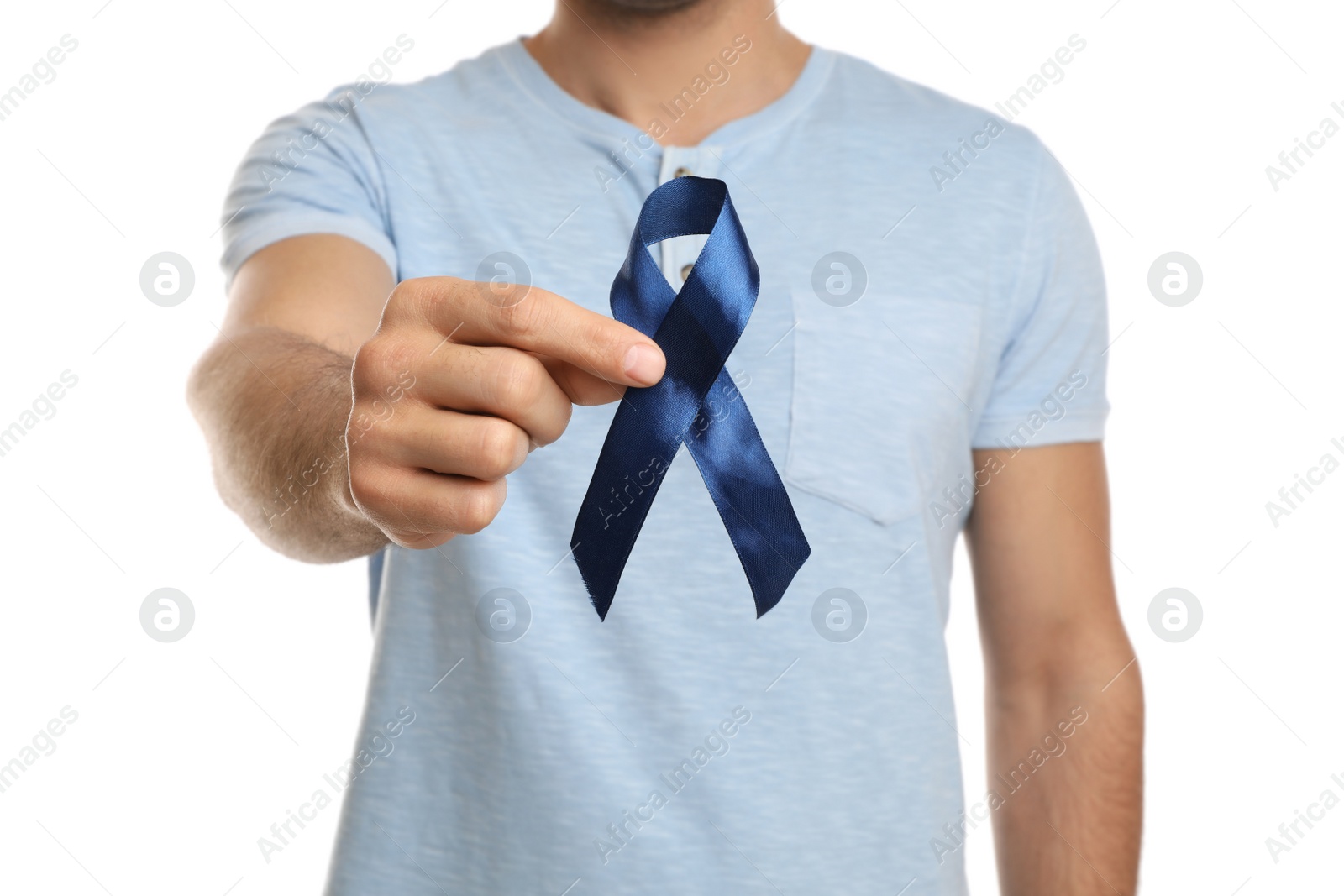 Photo of Man with blue ribbon on white background, closeup. Urology cancer awareness