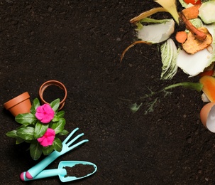 Gardening tools, flower and organic waste for composting on soil, flat lay. Natural fertilizer