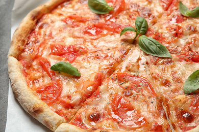 Delicious pizza Margherita on table, closeup view