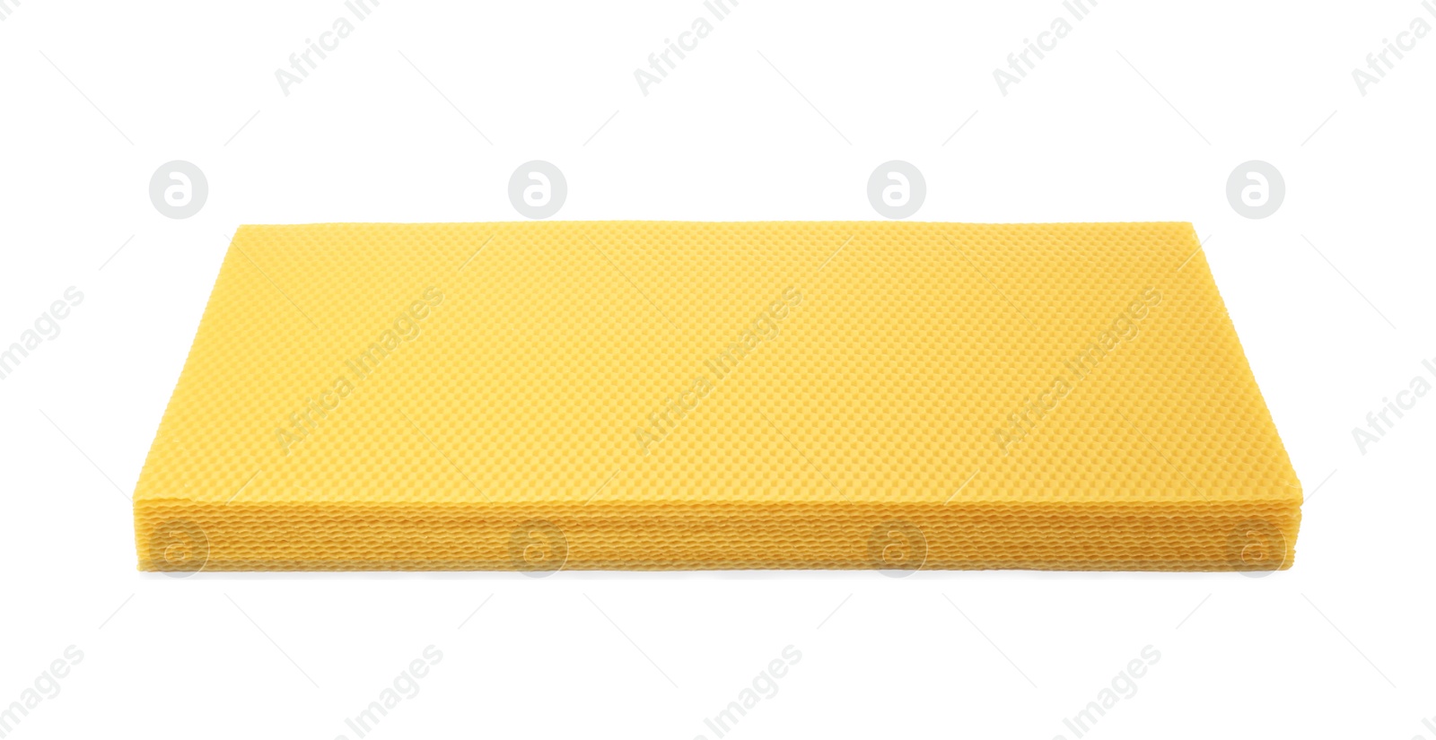 Photo of Natural organic beeswax sheets isolated on white
