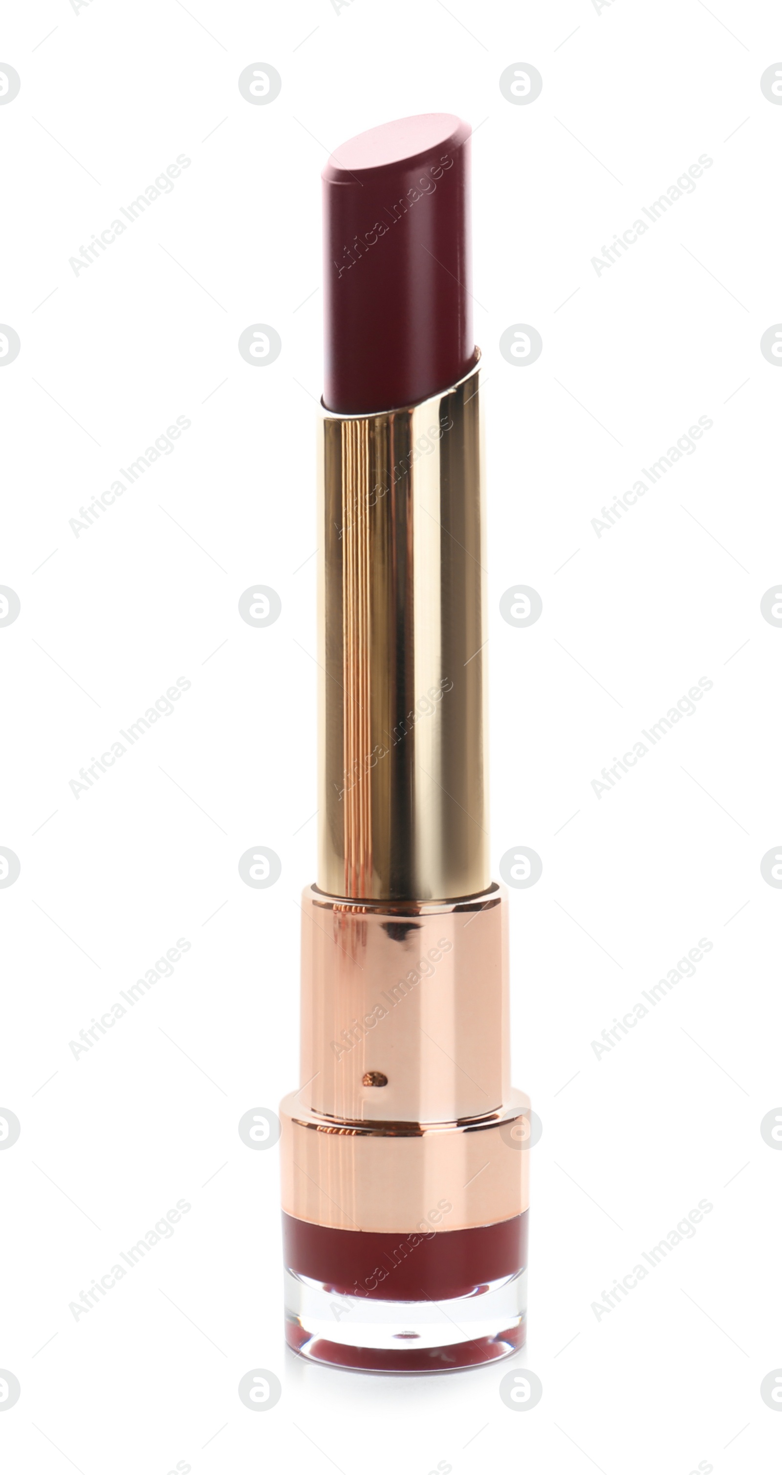 Photo of Beautiful lipstick on white background. Trendy makeup product