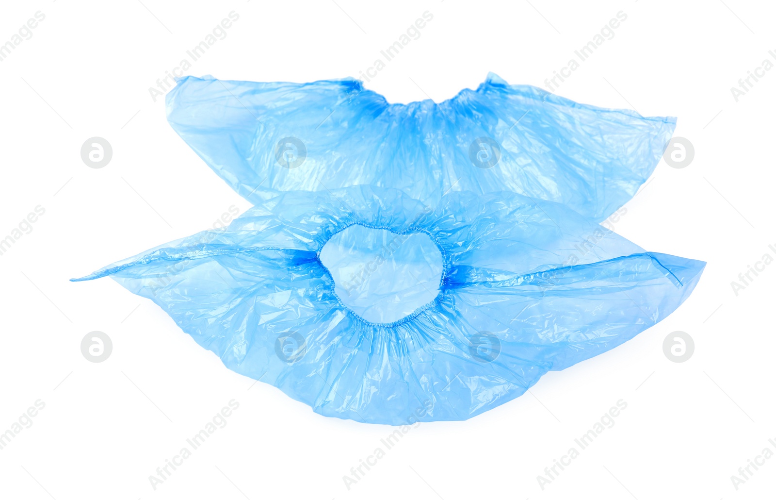 Photo of Pair of blue medical shoe covers isolated on white