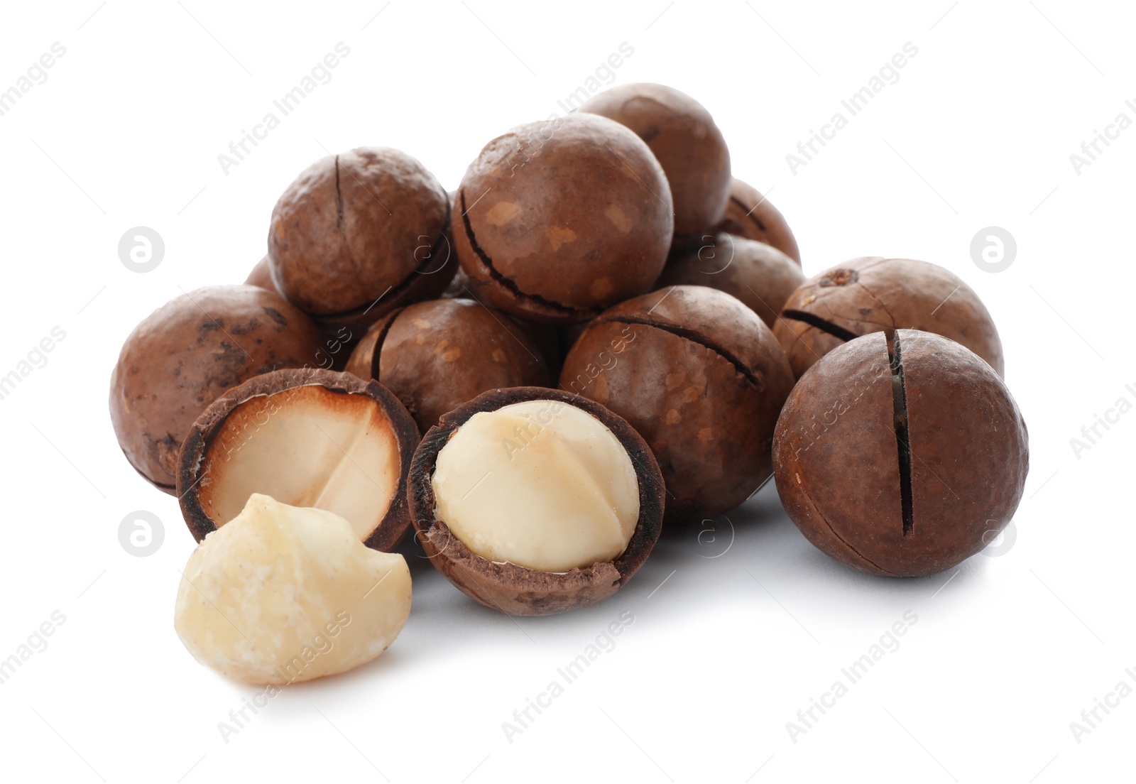 Photo of Pile of organic Macadamia nuts on white background