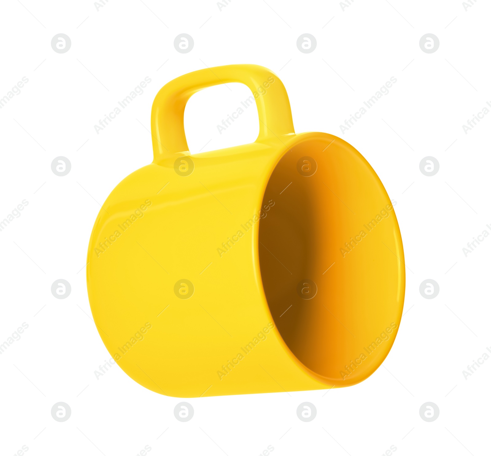 Photo of Clean yellow ceramic cup isolated on white