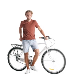 Handsome young man with bicycle on white background