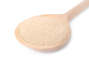 Photo of Wooden spoon with active dry granulated yeast isolated on white