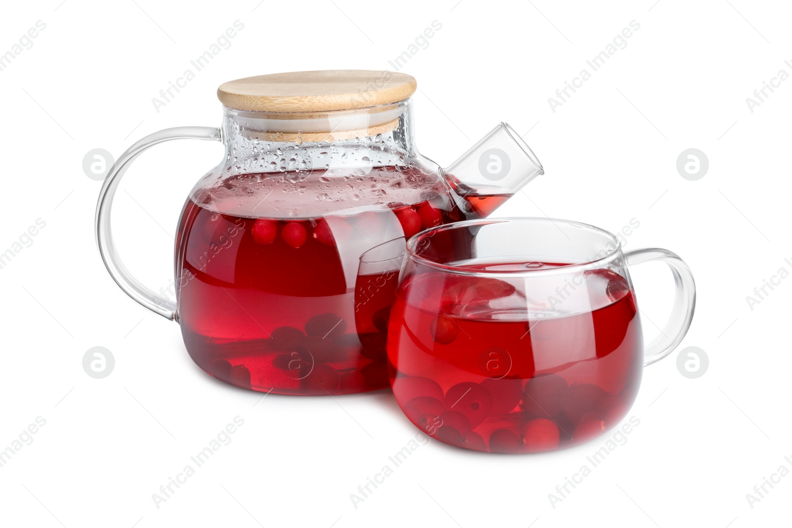 Photo of Tasty hot cranberry tea with fresh berries isolated on white