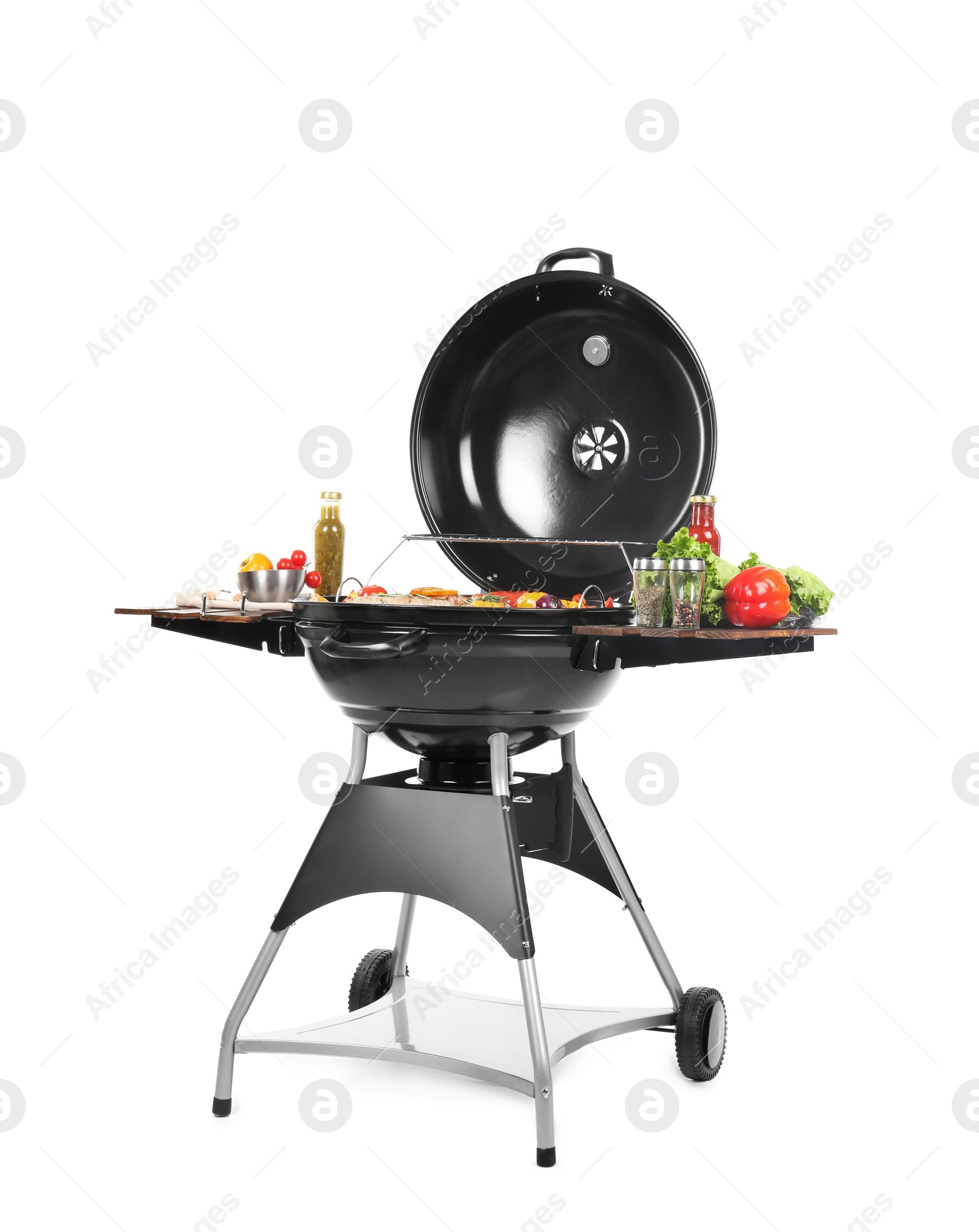 Photo of Modern barbecue grill with tasty food on white background