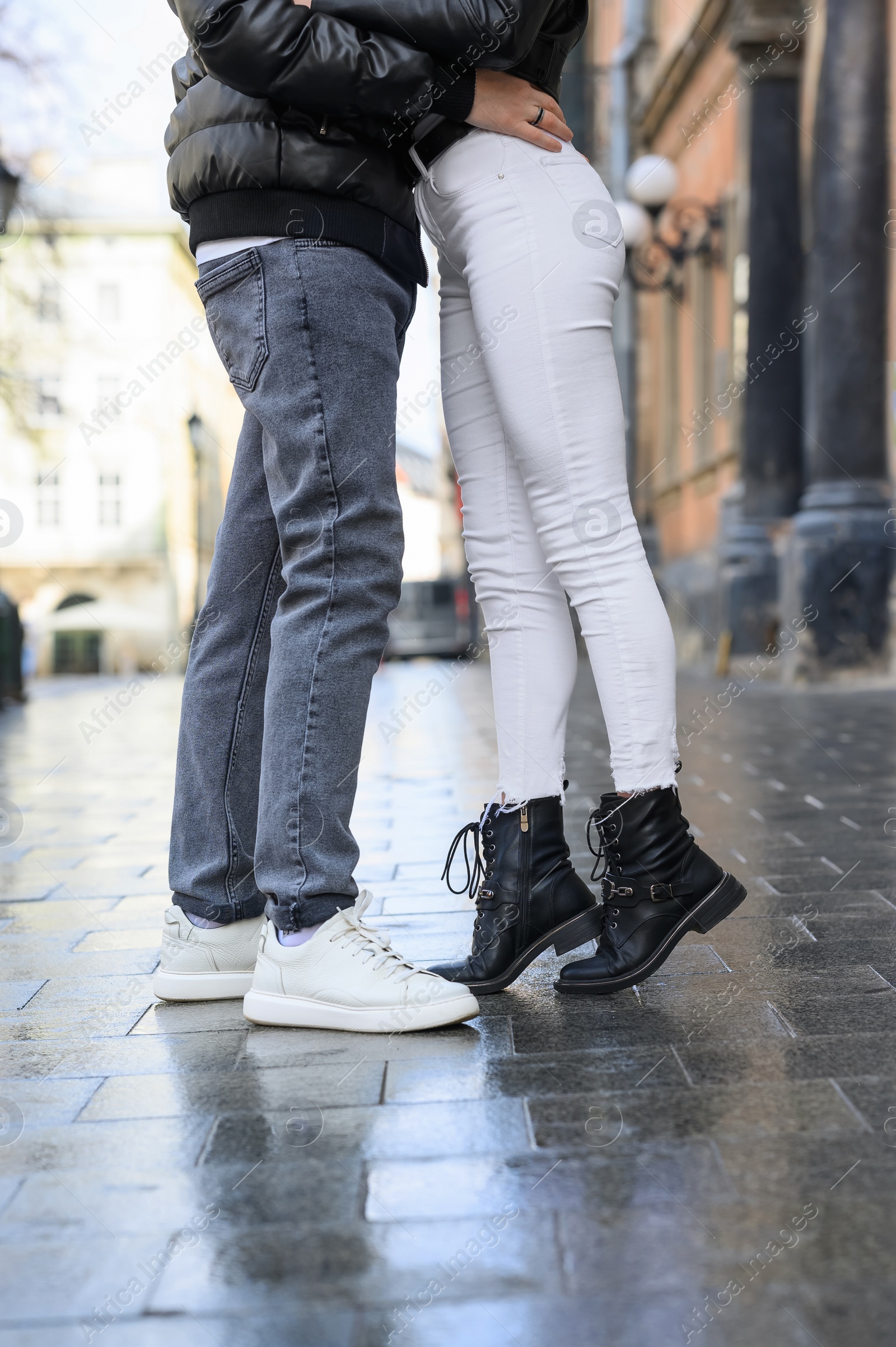 Photo of Lovely young couple enjoying time together outdoors, closeup. Romantic date