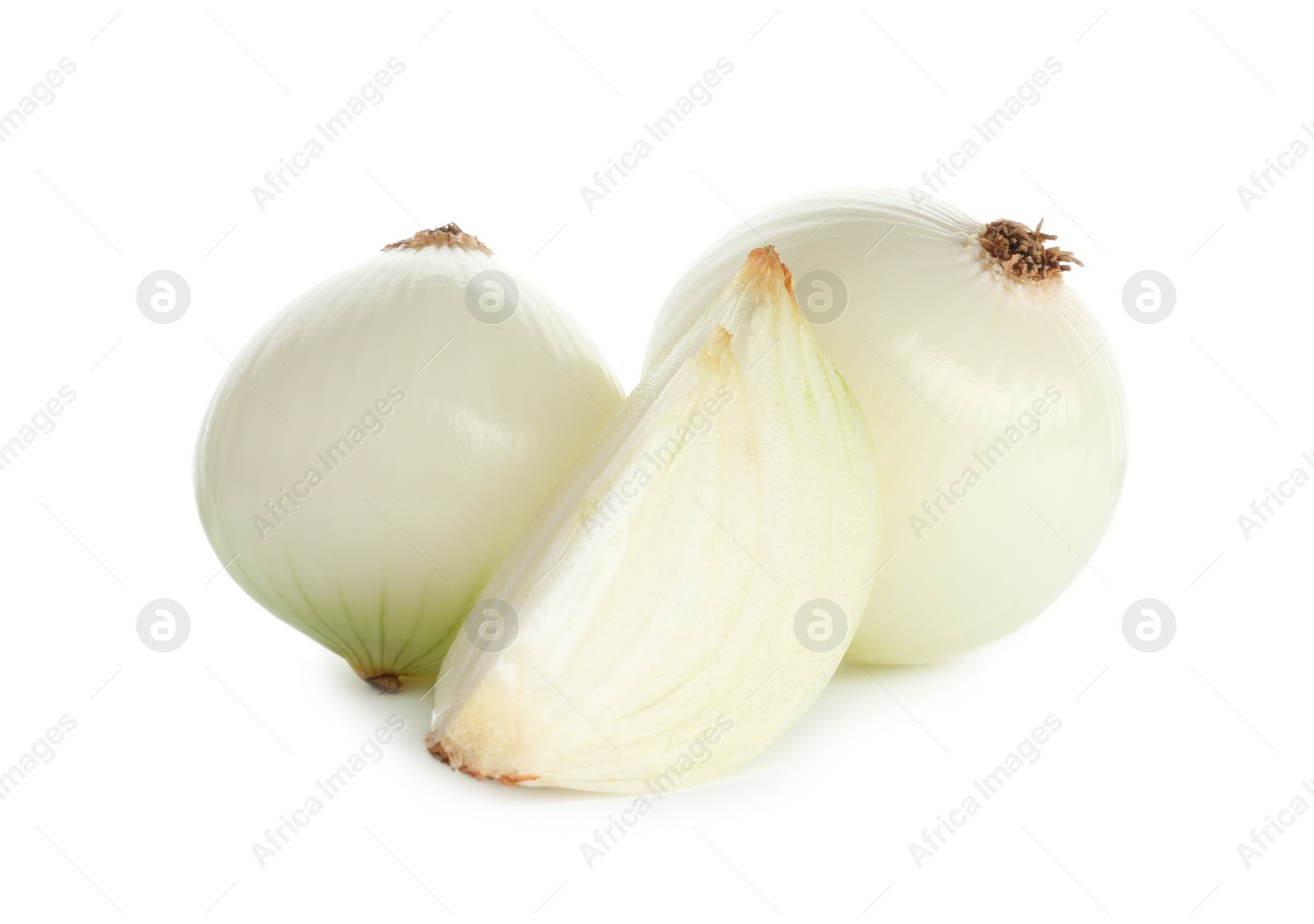 Photo of Fresh peeled onion bulbs on white background