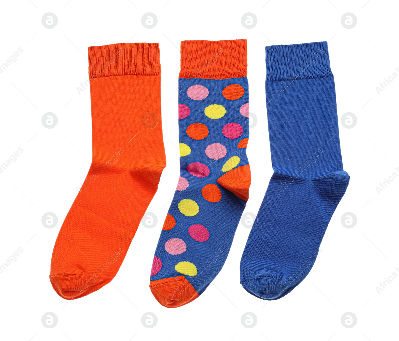 Photo of Different colorful socks on white background, top view