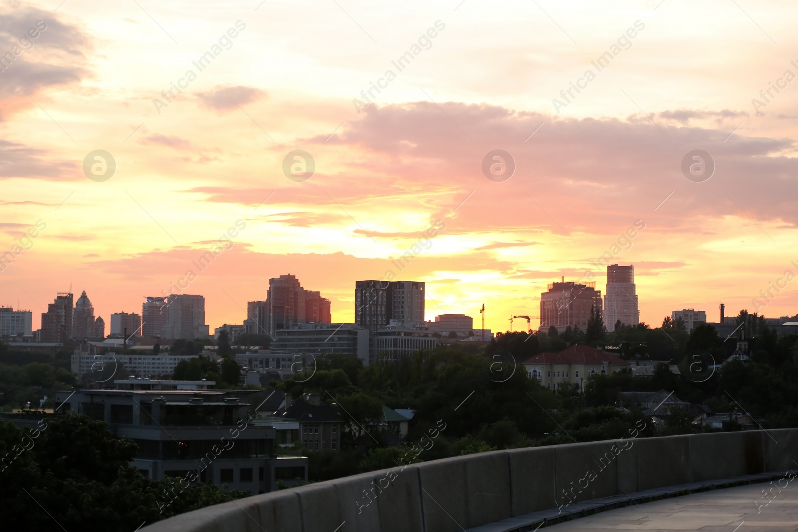 Photo of KYIV, UKRAINE - MAY 23, 2019: City district with modern buildings at sunset