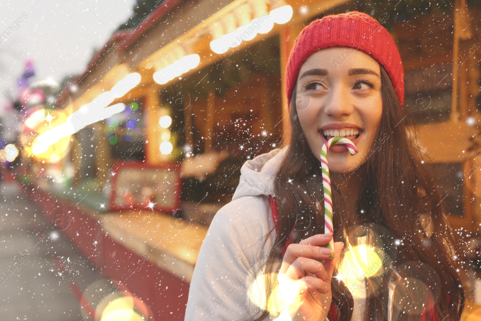 Image of Young woman spending time at Christmas fair, space for text