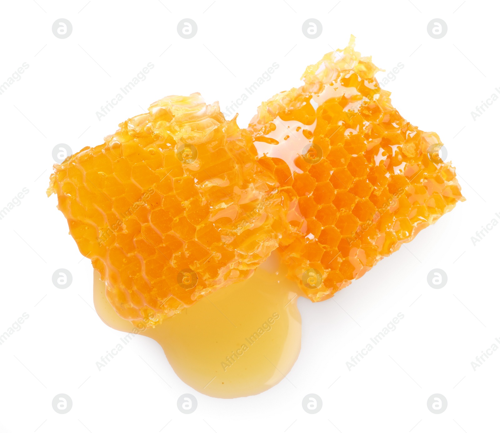 Photo of Natural honeycombs with tasty honey isolated on white, top view