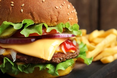 Delicious burger with beef patty and lettuce on blurred background, closeup