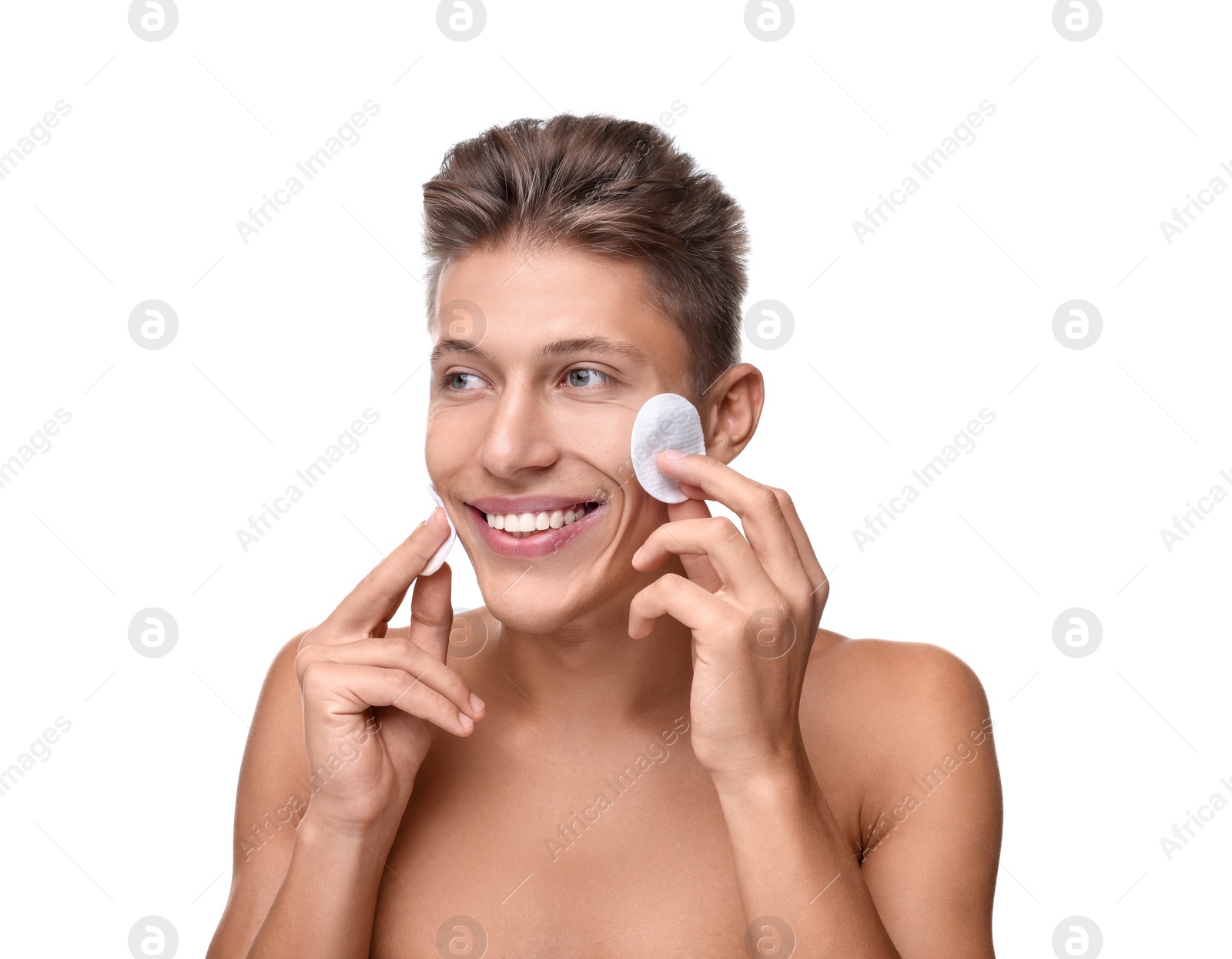 Photo of Handsome man with cotton pads on white background
