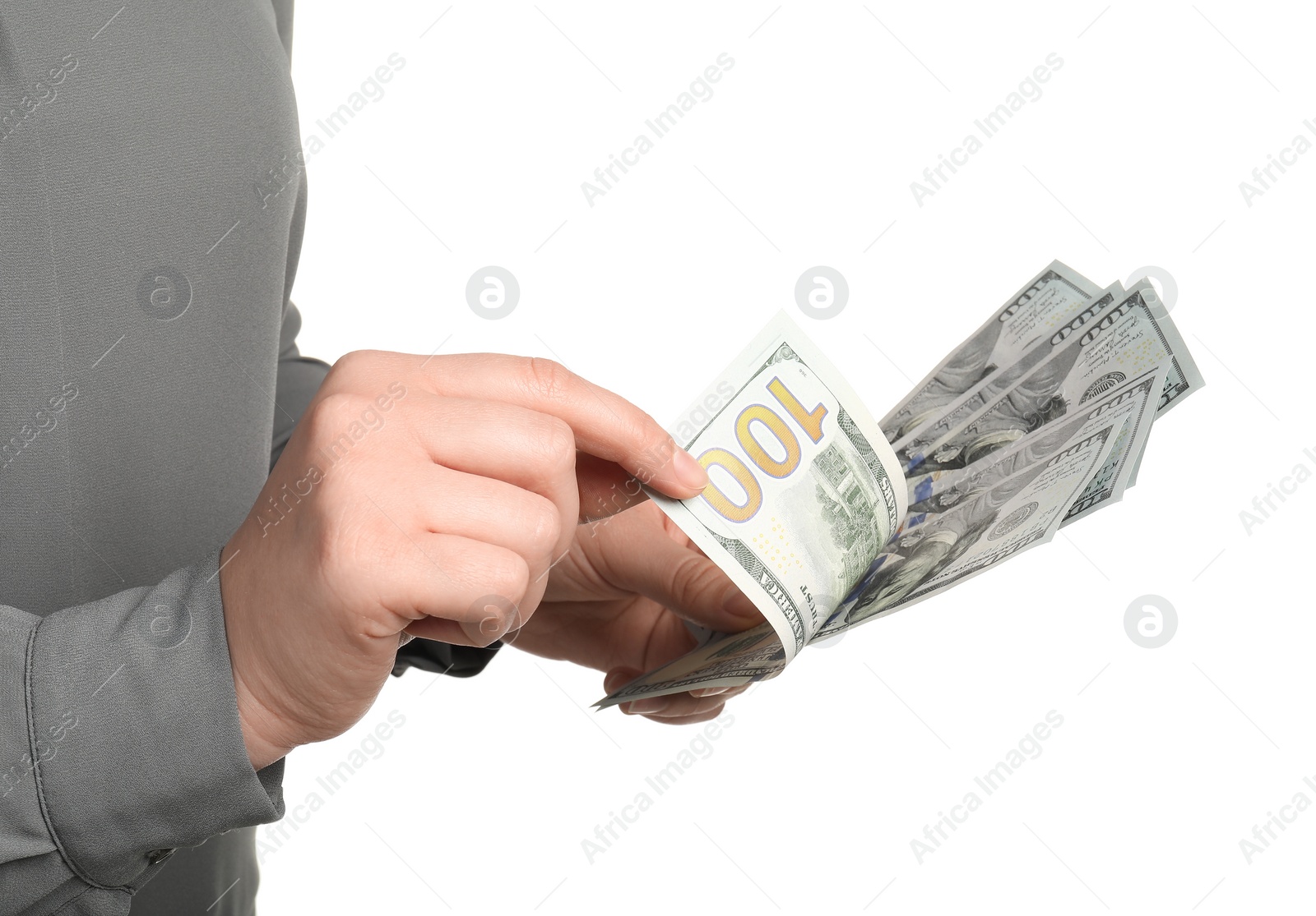 Photo of Money exchange. Woman counting dollar banknotes on white background, closeup