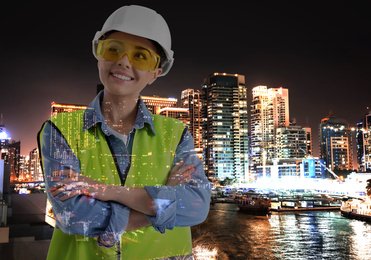 Image of Double exposure of engineer and city at night