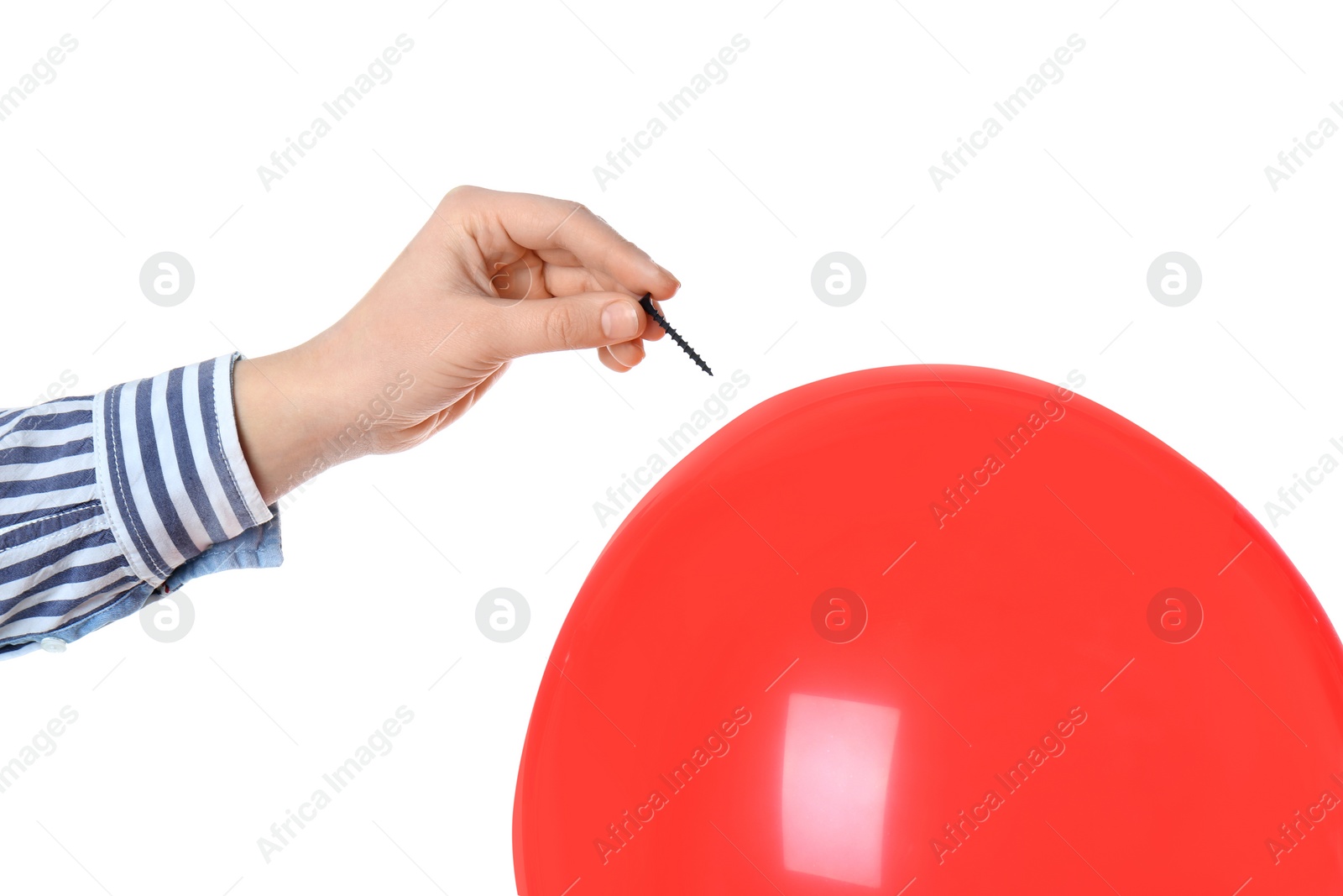 Photo of Woman piercing red balloon on white background, closeup